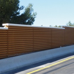 Noise barrier with stabilized wood aggregates